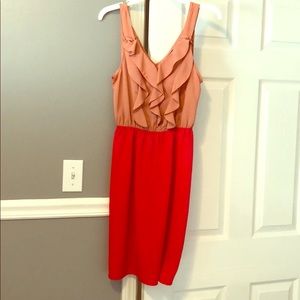 Knee length dress, tan too and red bottom